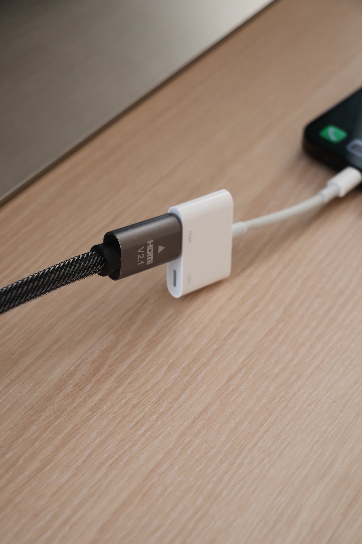 HDMI cable Connect an HDMI cable to iPhone's Lightning adapter