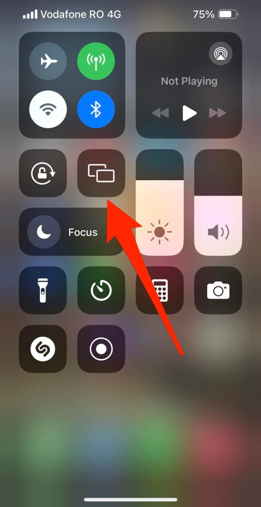 Tap on the Screen Mirroring tile in Control Center on your iPhone Tap on the Screen Mirroring tile in Control Center on your iPhone
