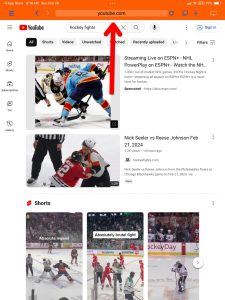 Screenshot of YouTube search results on iWebTV. A red arrow points to the search bar