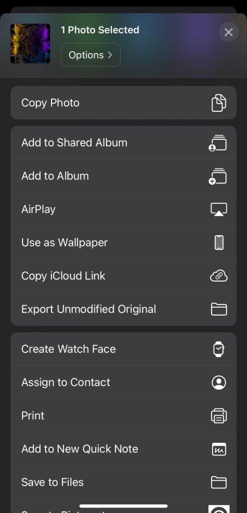 Tap the AirPlay button in the Photos app on iPhone